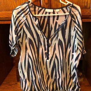 Cute top. Never worn. Perfect condition